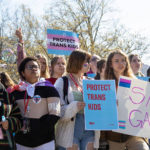 Teens gather in front of the Kentucky Capitol Annex building to protest against SB150, which would ban gender-affirming health care for transgender teens, on March 29, 2023, in Frankfort, Kentucky.