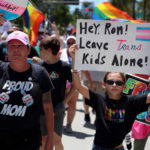 People participate in the 15th annual Miami Beach Pride Celebration parade on April 16, 2023 in Miami Beach, Florida.