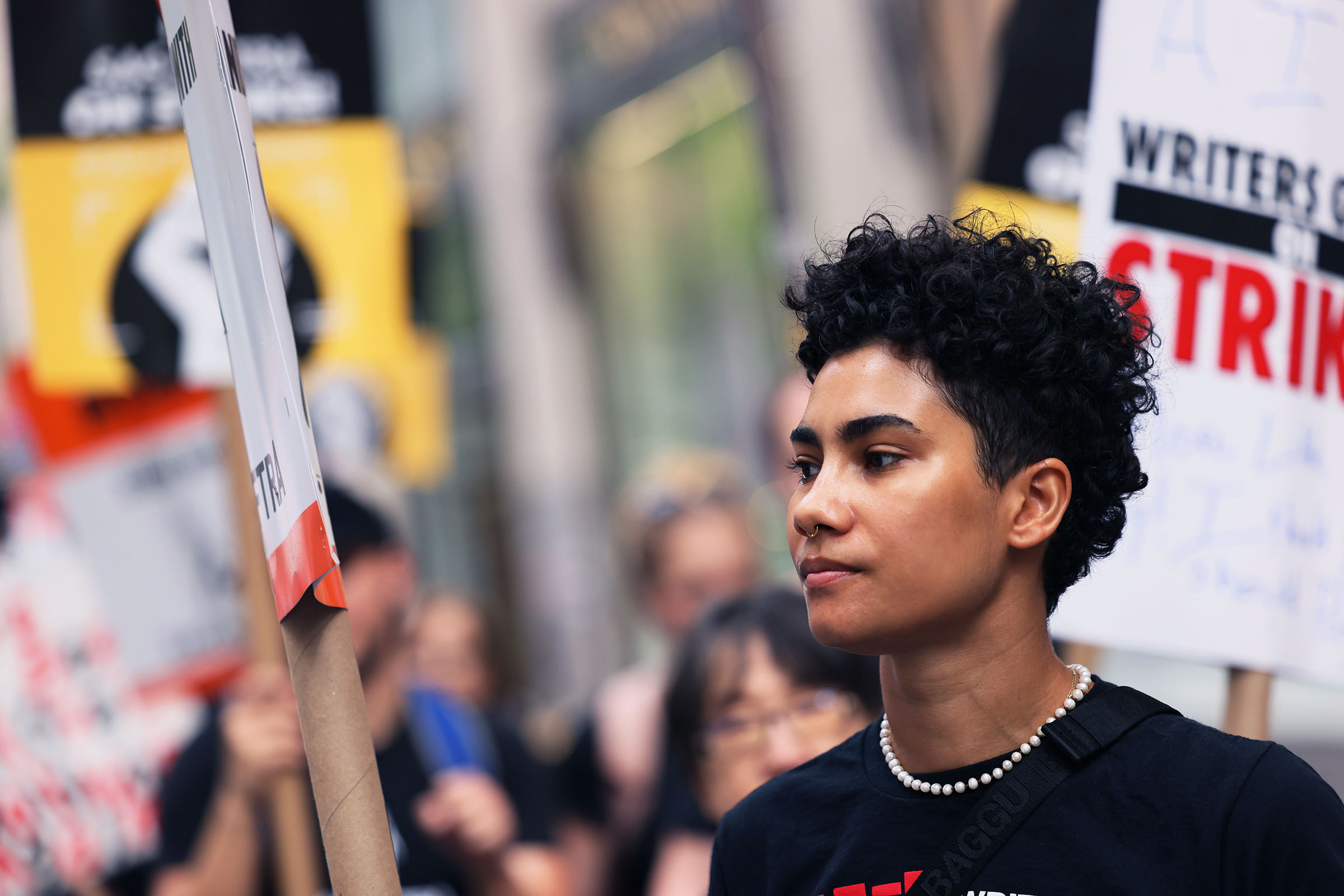 A young person participates in a strike