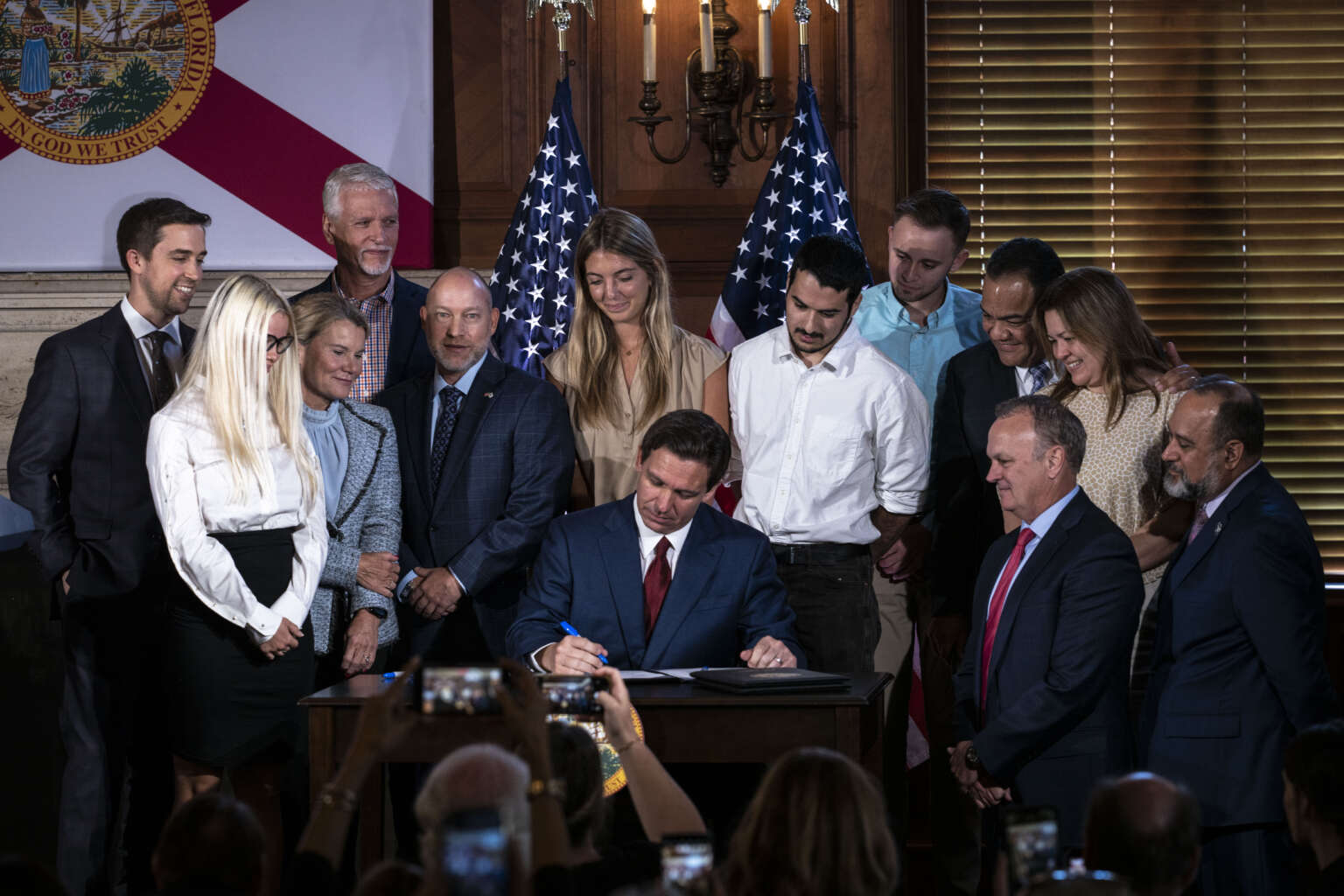 Florida Governor Ron DeSantis signs three education bills on the campus of New College of Florida in Sarasota, Florida on Monday, May 15, 2023.