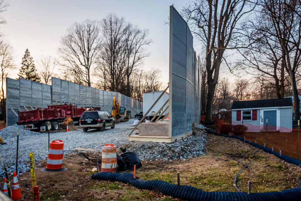 A home is seen next to a fracking site