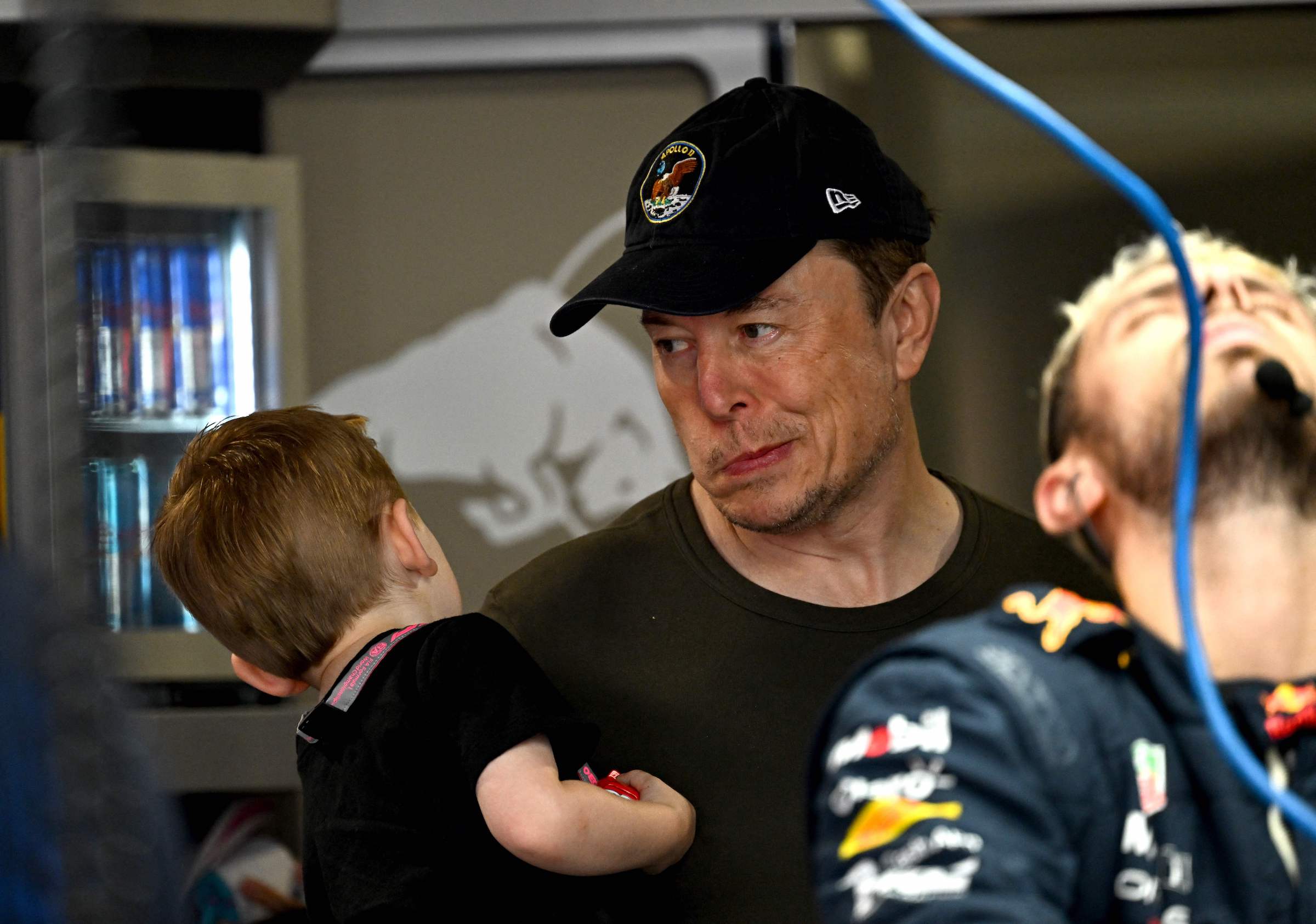 Elon Musk arrives at Red Bull Racing