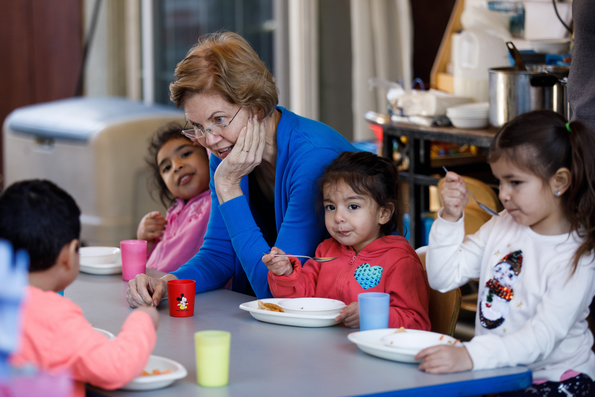 Sen. Elizabeth Warren interacts with children during her campaign event at Wise and Wonderful Daycare and Preschool in San Jose, California, on Dec. 27, 2019.