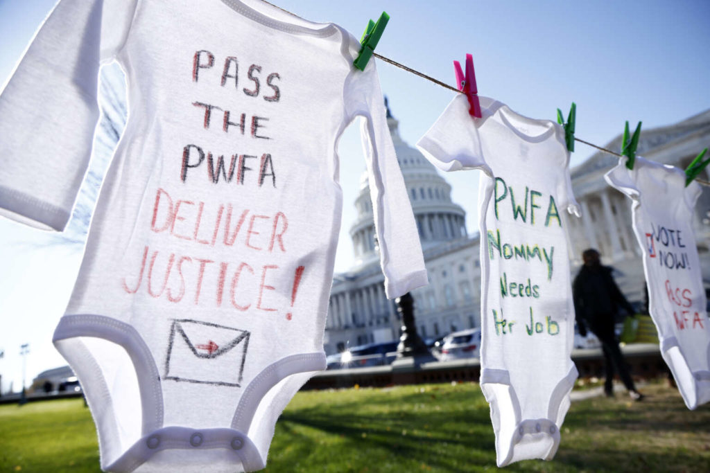 Advocates, legislators and pregnant workers rally on Capitol Hill in support of the Pregnant Workers Fairness Act on December 1, 2022, in Washington, D.C.