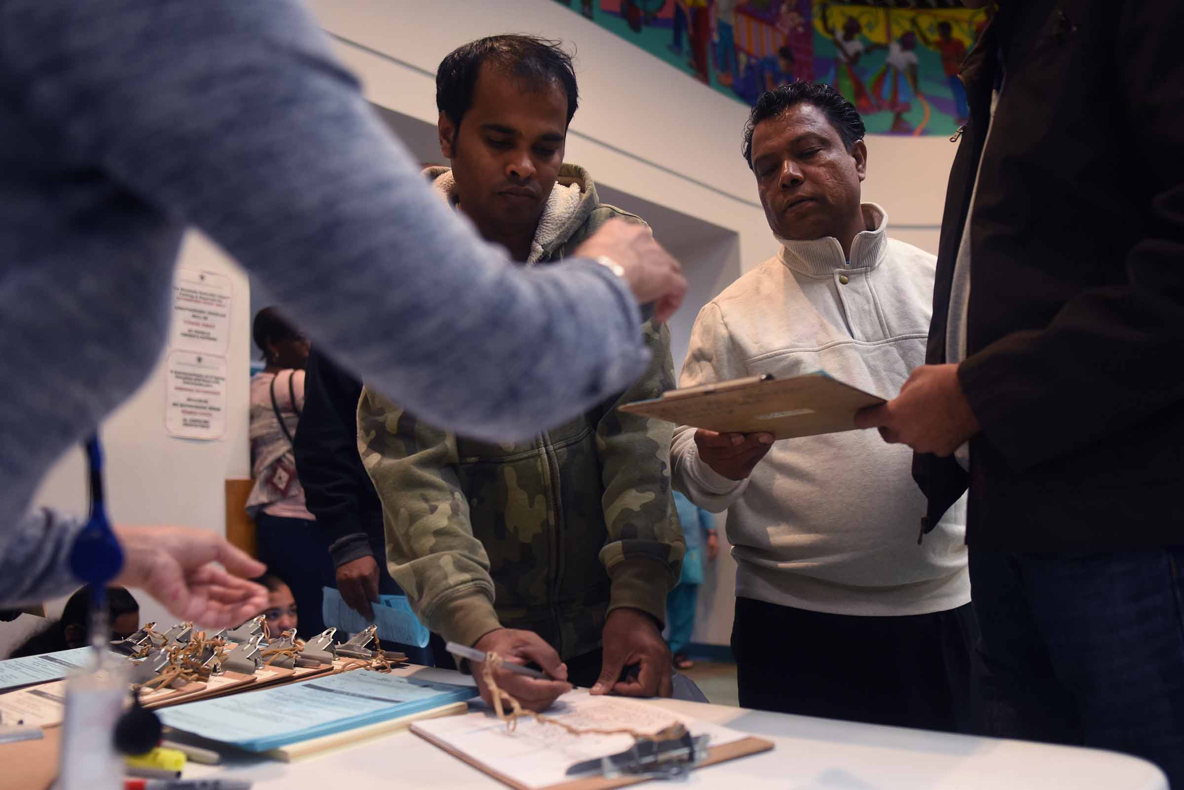 Two men sign up for healthcare