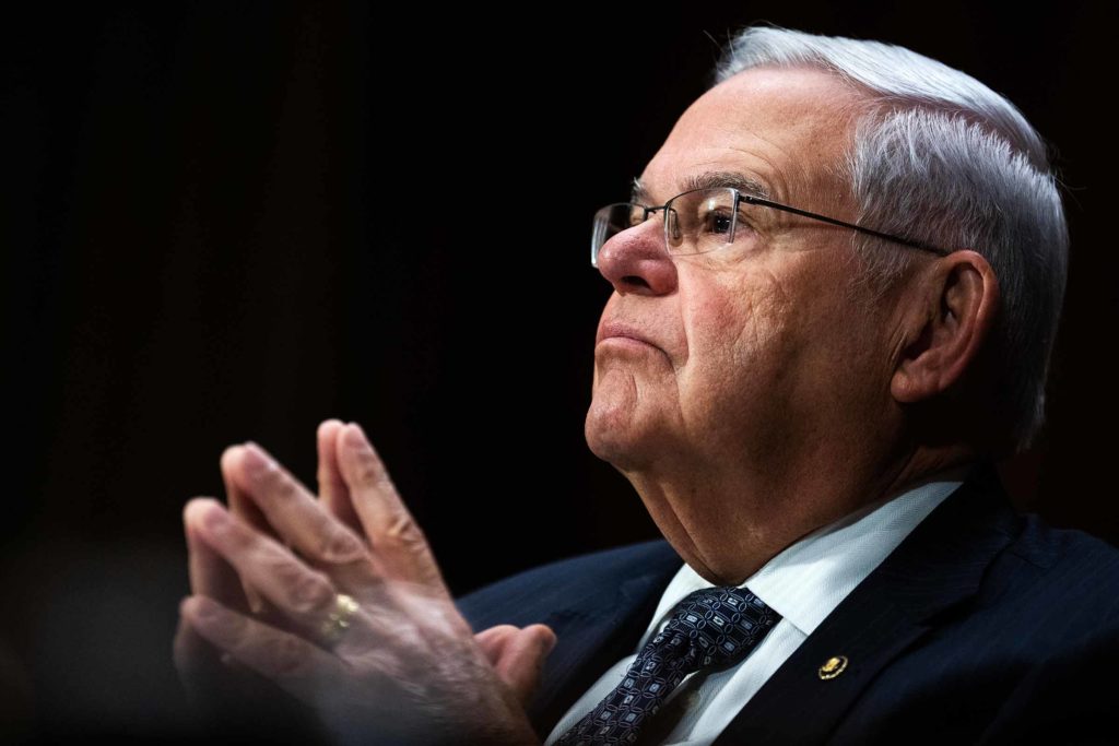 Robert Menendez steeples his fingers