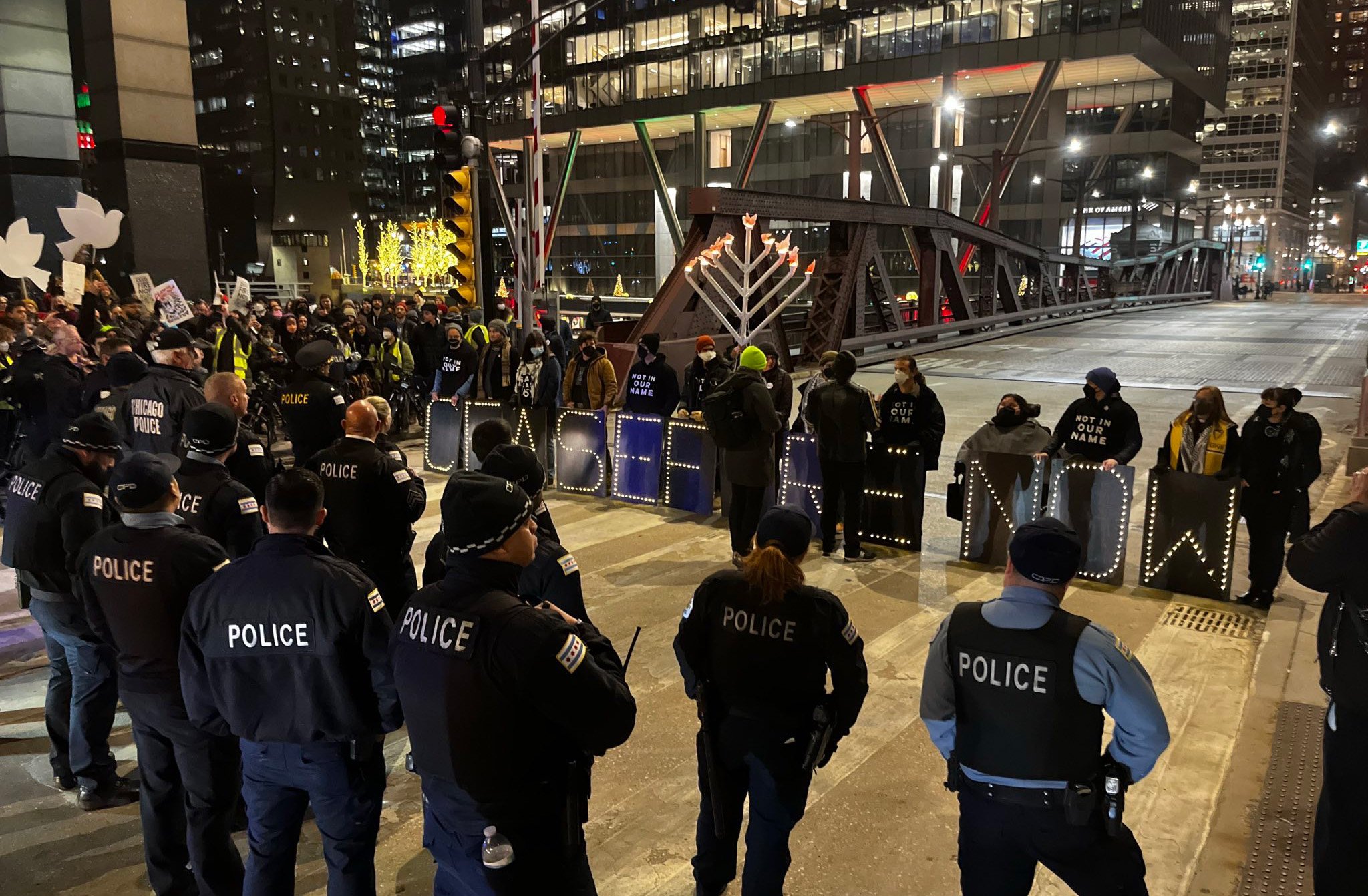 Jewish organizers and their allies participate in a demonstration at the Washinton Street Bridge in Chicago, Illinois, blocking traffic as part of protest to draw attention to Israel