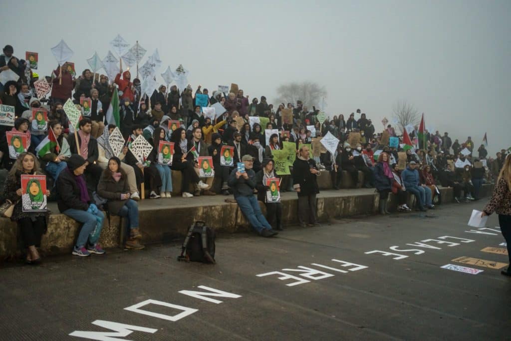 Hundreds gather at the lakefront to mourn Palestinian writer and activist Refaat Alareer, on December 23, 2023, in Chicago, Illinois.