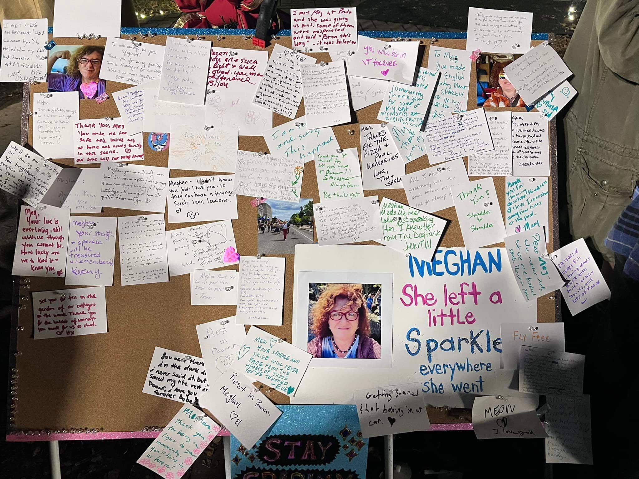 A board filled with messages in tribute to Meghan Lewis is pictured at her vigil.