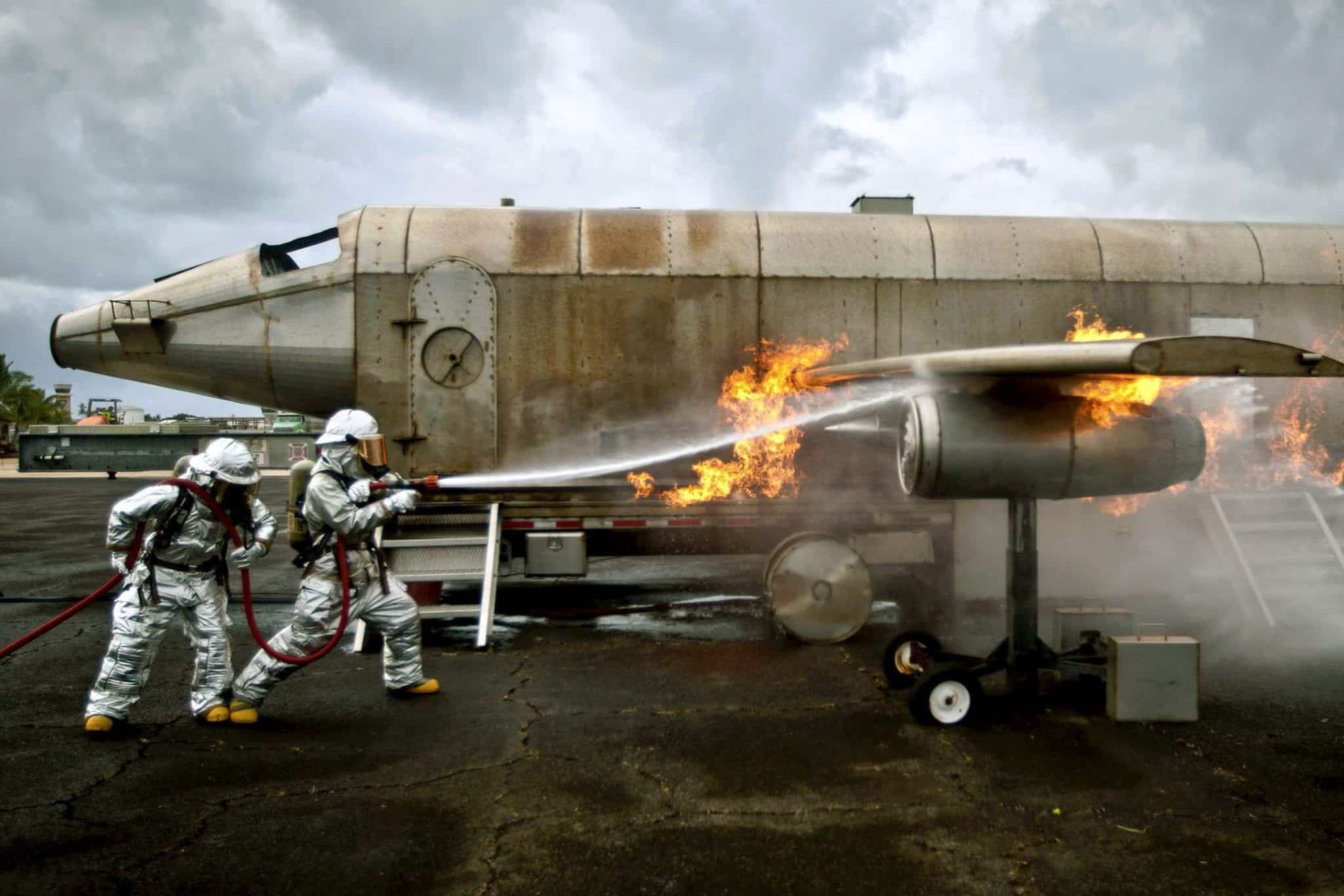 Marine Corps firefighters extinguish a fire during training at Marine Corps Air Station Kaneohe Bay, Hawaii, on June 3, 2016.